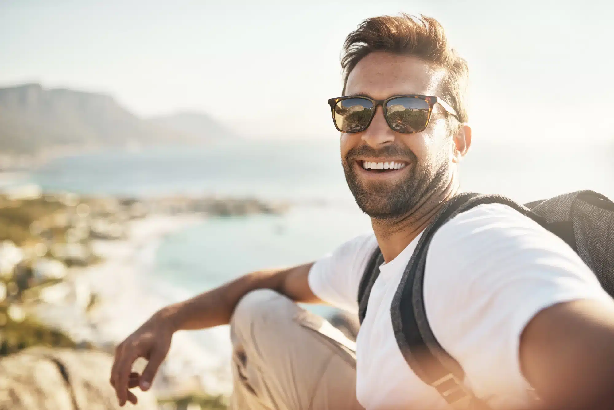 Person walking outdoors along a coastal path
