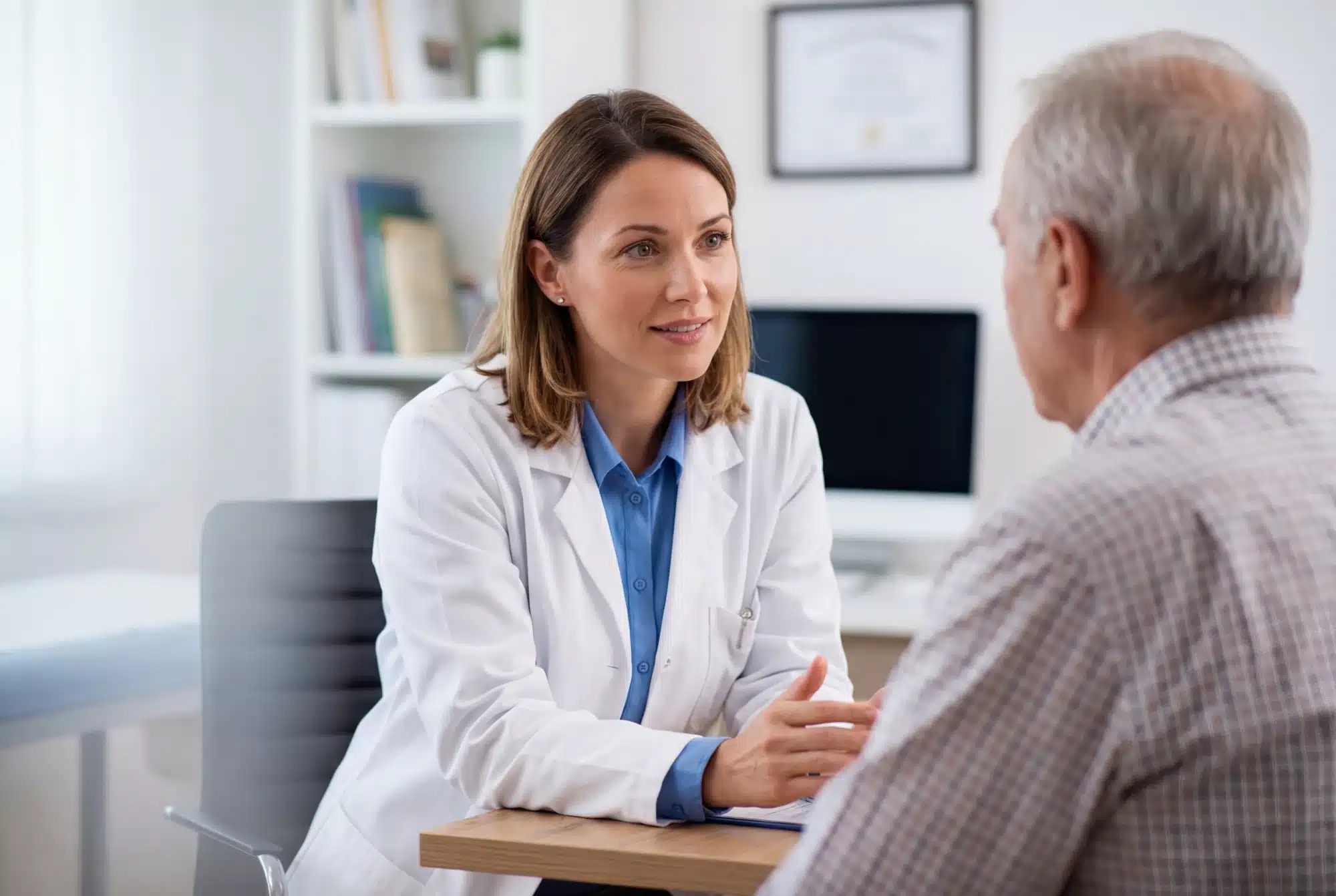 Person asking how long rehab is during a consultation.